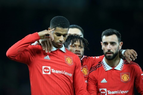 Marcus Rashford (left) celebrates with teammates after scoring Manchester United's third goal in their 3-1 win against Everton
