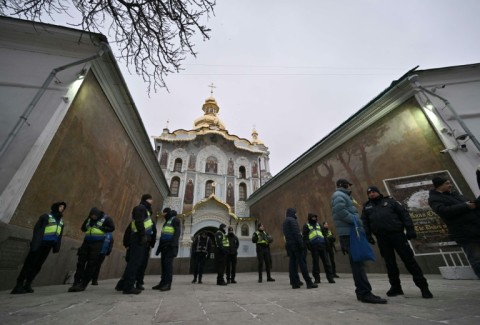 Policemen stood guard outside the service 