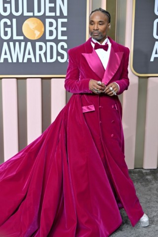 Actor Billy Porter wowed in a magenta velvet tuxedo dress reminiscent of his black 2019 Oscars look