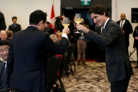 Canadian Prime Minister Justin Trudeau makes a toast with Japanese Prime Minister Fumio Kishida during a luncheon in Ottawa on January 12, 2023