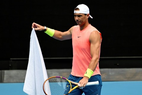 Rafael Nadal attends a practice session at Melbourne Park