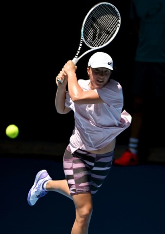 Poland's Iga Swiatek hits a return ahead of the Australian Open 