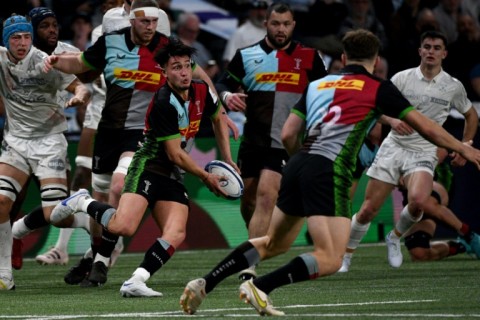 On the break: Harlequins fly-half Marcus Smith launches a break in Sunday's  game against Racing 92