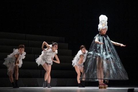 The dancers' futuristic headgear glints under the lights at a top ballet show, but just two months ago their plastic costumes were sticky bottles tossed into a Tokyo recycling bin