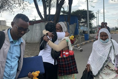 Passengers arriving from Tigray are greeted by relatives at the Bole International Airport in Addis Ababa on December 28, 2022 as flights resumed under a peace deal