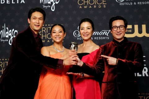 "Everything Everywhere All at Once" has topped the Oscar nominations with 11 -- (2L-R) Stephanie Hsu, Michelle Yeoh and Ke Huy Quan are all nominees, seen with cast member Harry Shum Jr