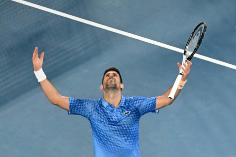 Serbia's Novak Djokovic celebrates his victory against Greece's Stefanos Tsitsipas