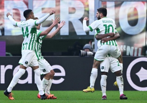 Domenico Berardi (R) had a hand in four of Sassuolo's goals at the San Siro 
