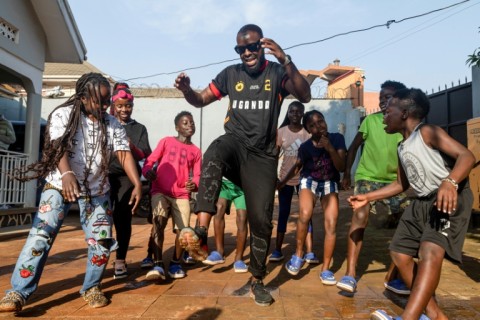 Eddy Kenzo rehearses a routine with Ghetto Kids, a prominent dance group in Uganda