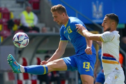 Ukraine defender Illia Zabarnyi (left) has joined Bournemouth