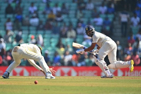 India's captain Rohit Sharma plays a shot during the second day of the first Test