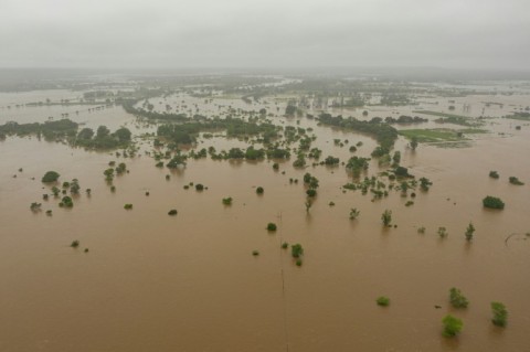 The Umbeluze river in full flood after heavy rains in the Boane district of Maputo