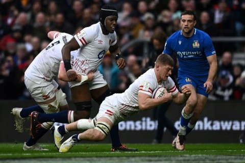 Opening score - England flanker Jack Willis dives to score the hosts' first try against Italy at Twickenham