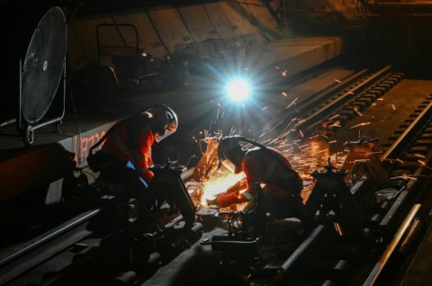 Maintenance staff have to be quick to finish before trains start up again at dawn