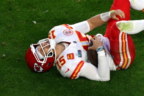 Kansas City quarterback Patrick Mahomes lay on the field in pain after aggravating an ankle injury during the Super Bowl but returned to lead the Chiefs to victory over Philadelphia