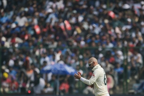 Australia's Nathan Lyon prepares to bowl during the second day of the second Test between India and Australia on February 18
