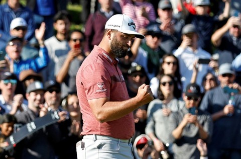 Spain's Jon Rahm on the 18th green after winning the Genesis Invitational at Riviera Country Club