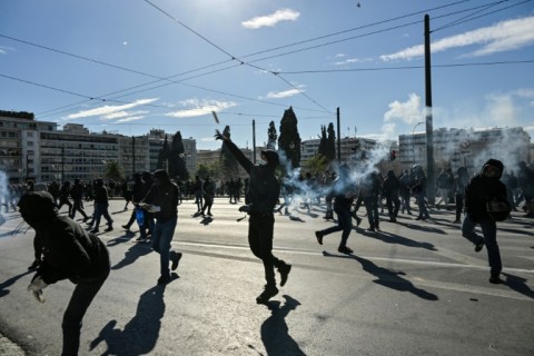 Demonstrators and police clashed during protests in Athens over the country's worst train tragedy