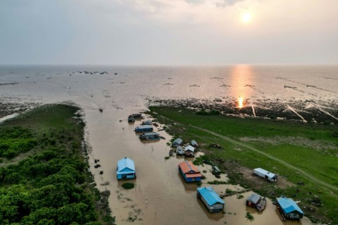 Around 100,000 people live in floating houses on Cambodia's vast Tonle Sap lake