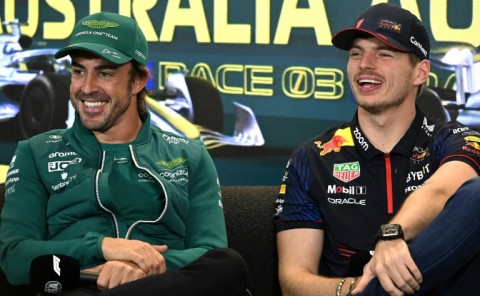 Red Bull's Max Verstappen (R) and Aston Martin's Spanish driver Fernando Alonso in Melbourne