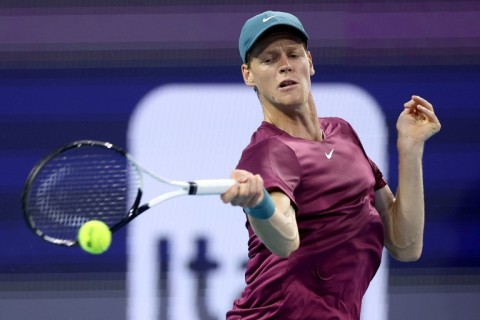 Italy's Jannik Sinner is through to the final of the Miami Open after beating defending champion Carlos Alcaraz of Spain