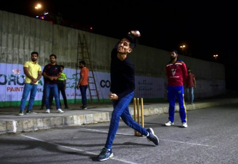 Tape-ball games are ubiquitous across Karachi's streets throughout the year, but Ramadan sees night tournaments pop up in most neighbourhoods