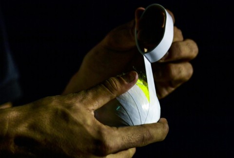 A tennis ball is tightly bound with electrical tape, giving it extra weight so it swings much like a cricket ball
