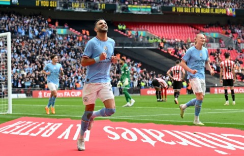 Manchester City's Riyad Mahrez celebrates scoring against Sheffield United