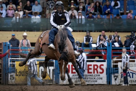 An inmate competes in Bareback Horse Riding during the Angola Prison Rodeo