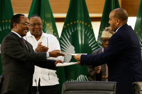 Ethiopian government representative Redwan Hussein (left) and Getachew Reda of the Tigray People's Liberation Front (TPLF) signed the peace deal in Pretoria 
