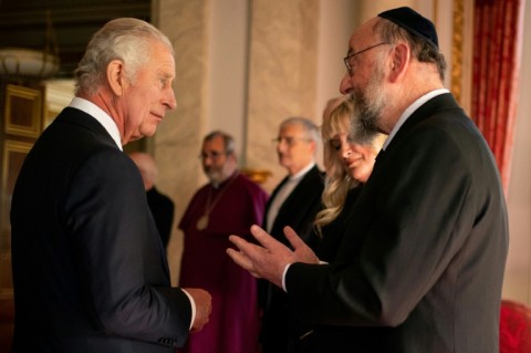 Britain's Chief Rabbi Ephraim Mirvis (R) praised King Charles III for allowing him to attend the coronation without breaking Shabbat rules