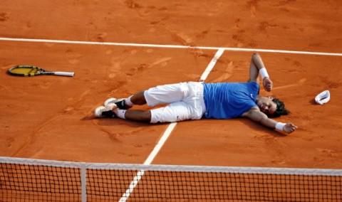 Rafael Nadal celebrates after defeating Swiss Roger Federer in the 2006 final
