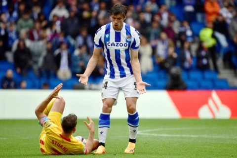 Real Sociedad's French defender Robin Le Normand (R) can now play for the Spanish national team
