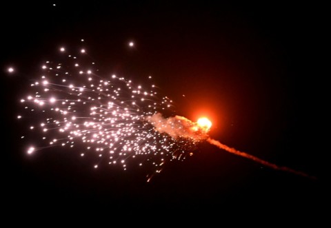 This photograph taken on May 28, 2023, in Kyiv, shows the explosion of a drone after it was shot down during a massive Russian drone strike mainly targeting the Ukrainian capital