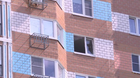Building window damaged after a rare drone attack hits Moscow