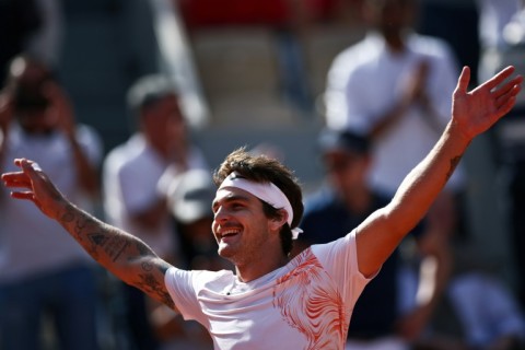 Victory: Brazil's Thiago Seyboth Wild celebrates after victory against Daniil Medvedev