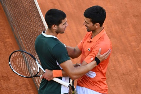 New era? Carlos Alcaraz (left) after defeating Novak Djokovic in the Madrid Open semi-finals in 2022
