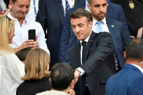 Macron watched the French Top14 rugby final on Saturday before heading to the locker room 