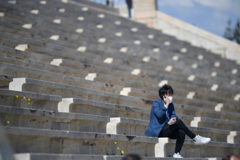 Sections of the torch relay for the pandemic-delayed Tokyo 2020 Games were either held behind closed doors or barred to overseas fans