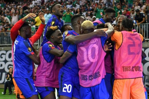 Haiti's forward Frantzdy Pierrot celebrates scoring the winner in the 2-1 victory over Qatar in a CONCACAF Gold Cup Group B match 