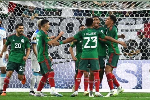 Luis Romo celebrates his second goal as Mexico crushed Honduras 4-0 in the CONCACAF Gold Cup group B in Houston on Sunday