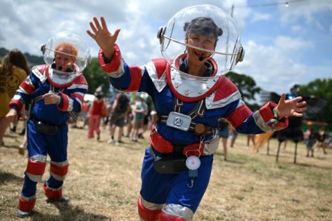 Performers entertain Glastonbury festivalgoers in Somerset, southwest England