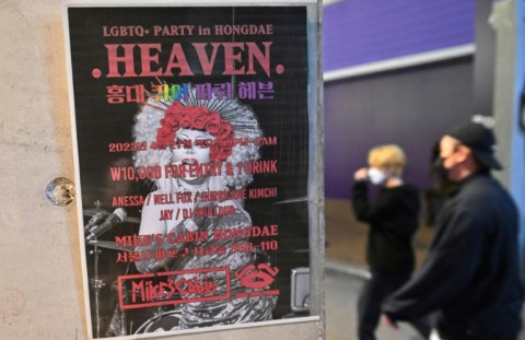 A poster on a wall in Seoul's Hongdae nightlife district advertises a drag show