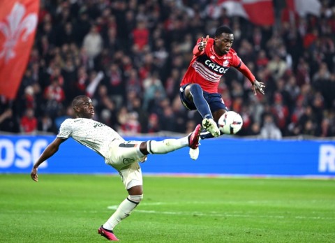 Timothy Weah (R) is heading to Italy after four years at Lille
