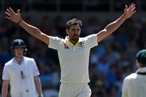 Australia's Mitchell Starc celebrates his dismissal of England captain Ben Stokes