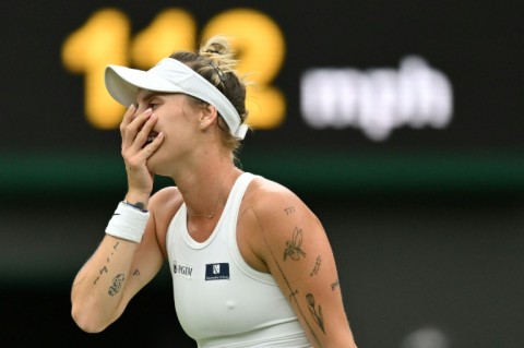 Marketa Vondrousova reacts after beating Jessica Pegula to reach the Wimbledon semi-finals