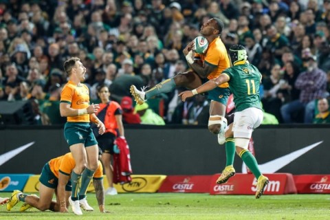 Australia's wing Suliasi Vunivalu (C) was axed for their clash against Argentina