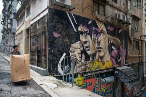 A Hong Kong mural pays tribute to Bruce Lee, whose films spawned a kung fu craze around the world