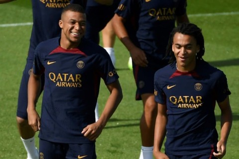 Kylian Mbappe (left) and his younger brother Ethan  at PSG training ahead of the club's Japan tour, which the older brother will now not be joining