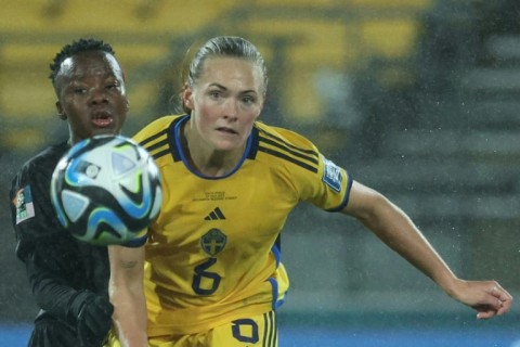 Sweden's Magdalena Eriksson (R) in action in her country's opening Women's World Cup game against South Africa